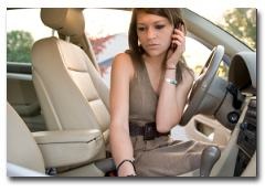 Woman working in car with Dial Through